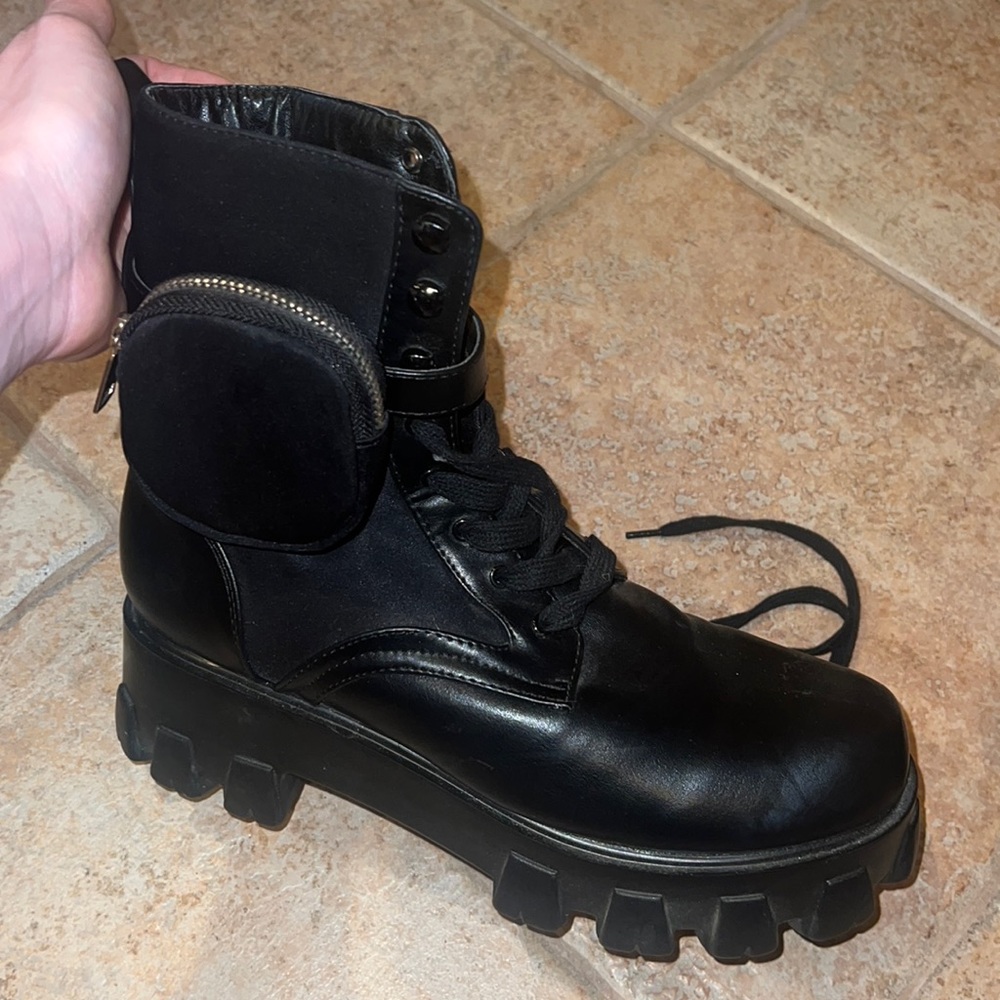 Black combat boots with pocket on side